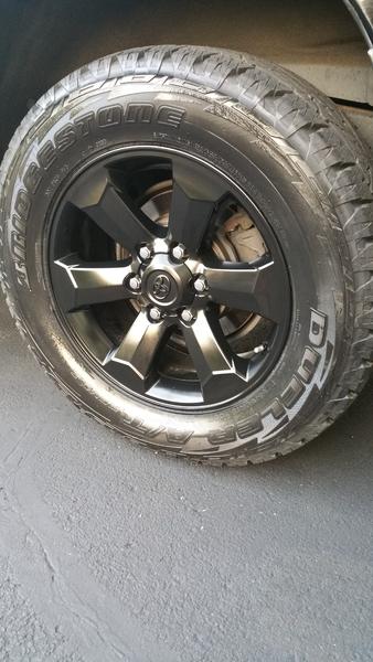 OEM 18" with 50% Gloss Black PC
BS Revo II 265/60
