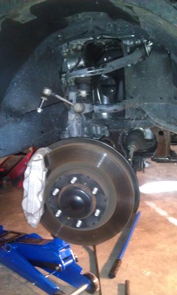 OEM coilover out.