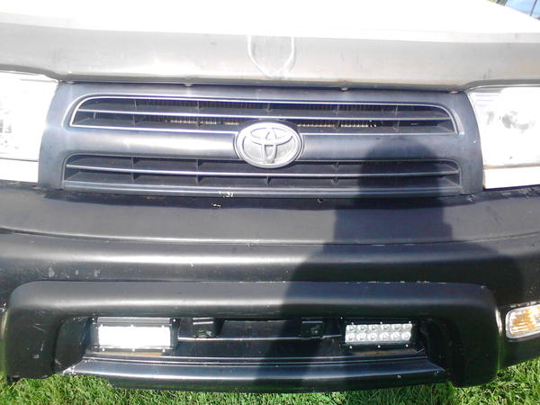 Old factory grill and led pods that are installed on the rear of my roof basket as rear aux lights hooked on led toggle switch