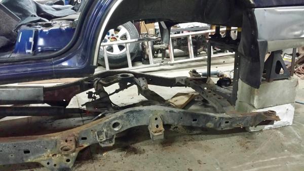 Old frame is pretty crusty. Previous owner welded in sheet metal and spray canned it black to cover up all the rot. Body however is in excellent shape