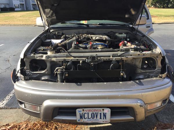 Old headlights and grille off, about to put on the new.