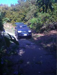 only one way to turn around, cliff on one side, wet leaves, wet DG and crumbing road. Why do you need 4WD they ask.