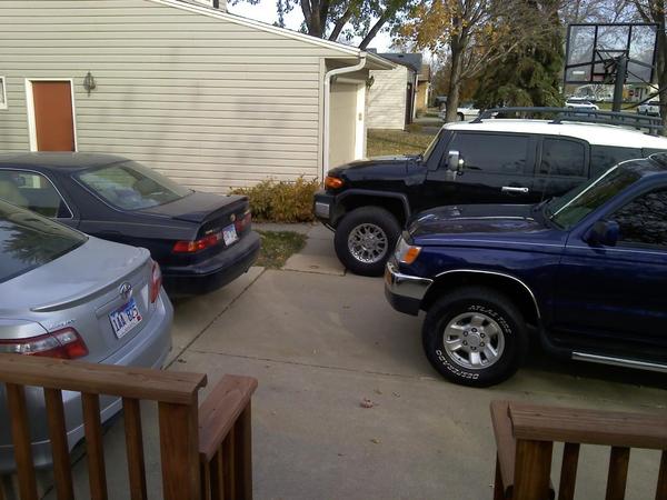 Our family driveway the week b4 i traded off my FJ. 07 FJ, 07 Camry SE, 97 4R, 97 Camry XLE.