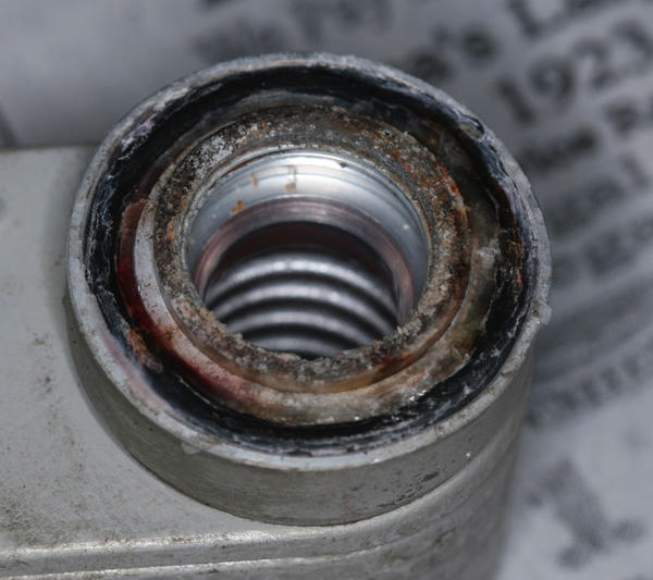 Outlet side of cooler, exhibiting the samecorrosion as the fitting. O-ring doesn't look so good, showing contamination at the interface where the rubb