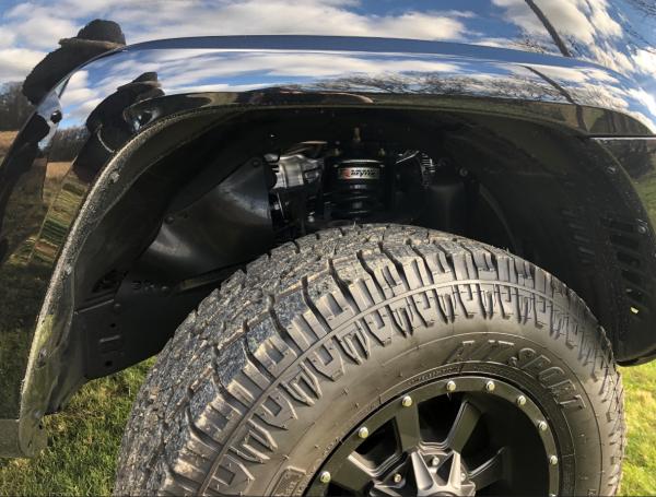 Passenger front suspension peek