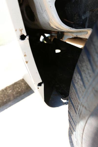 Passenger side, rear bumper cover, mud flap was torn off when I backed into a dirt berm & it caught the flap.