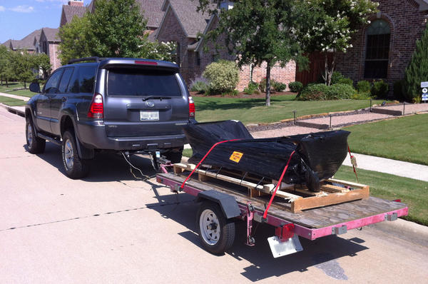 Picked up my freight from CBI Off-road:  rear bumper with swingout tire carrier and weld-on rock sliders.