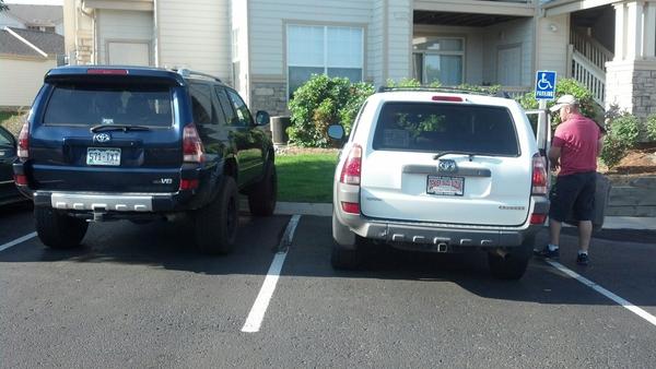 Picture of my white 03 SR5 that I just purchased next to Brutus.