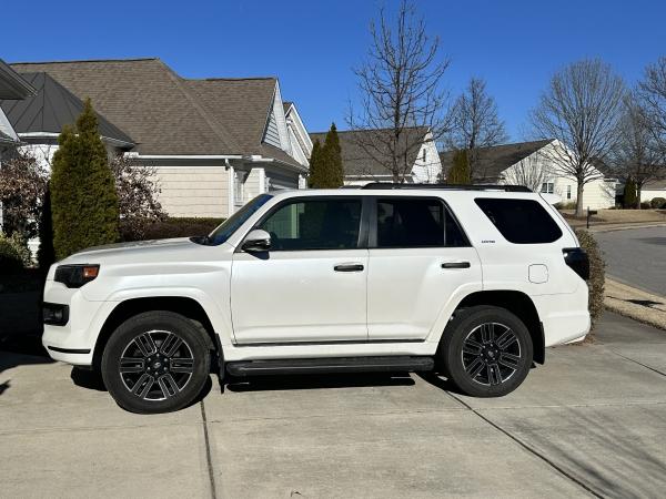 Plasti Dip on chrome at top of door above handle; ABS handle caps with smart key; Plasti Dip on chrome along running board edge; Wheel overlays; Plast