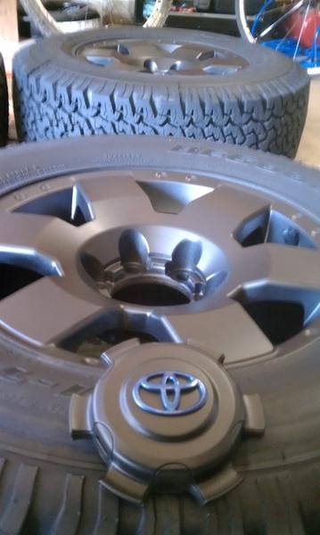 Plastidipped FJ wheels with Metallic blue Toyota symbol