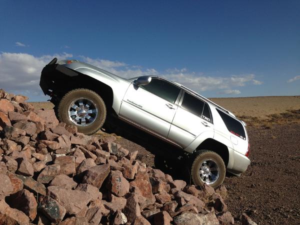 Playin in the rocks, and I would have climbed to the top but it was to narrow for my fat girl!