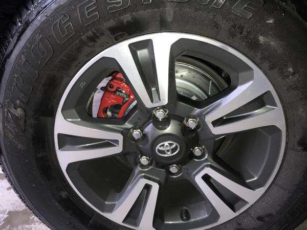 Power Stop brakes in the rear. Slotted and drilled rotors, coated calipers, composite and carbon fiber pads.