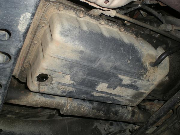 Prior to removing the pan.