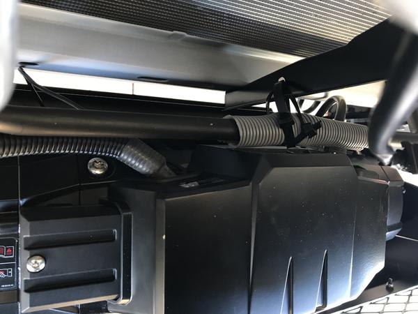 PS line brackets bent to get the line out of the way of the winch control box - no relocation needed