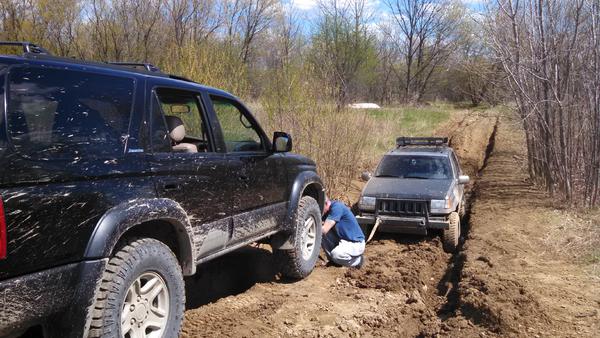 Pulling A lifted GC out of a whole in Waterford, MI.