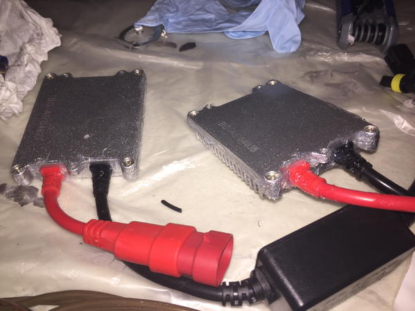 Put a thin bead of RTV clear silicone around the ballasts for improved weatherproofing.
