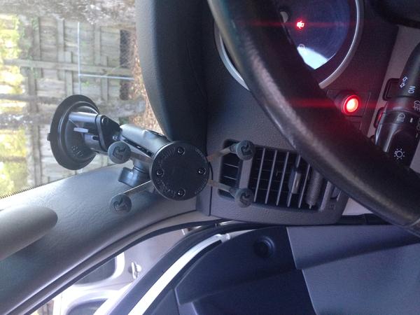 RAM mount. Super nice, doesn't jiggle or rattle at all.