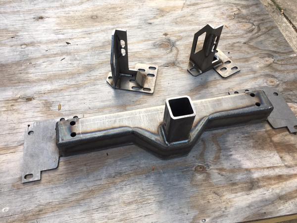 raw metal.  Great craftsmanship and quality wells.  This thing is solid!