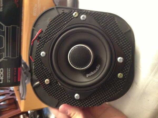 Rear door speakers, Pol 400dxi series. I had to cut a bracket out of the mesh plastic in order to mount them to the bracket that screws into the door.