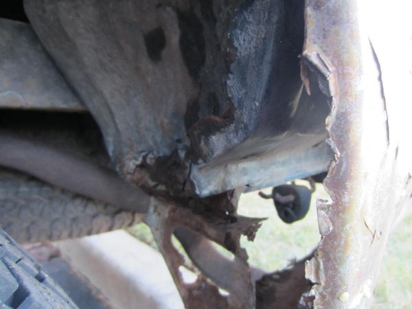 Rear driver side wheel well