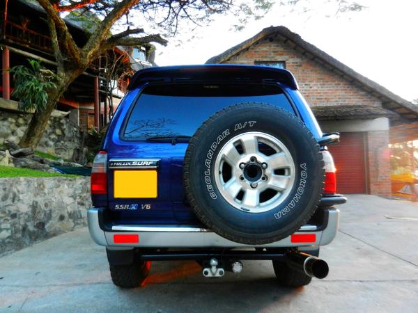 Rear end, Only addition is the Tow Hitch. The Spare Wheel carrier is a Toyota Standard. Japanese Spec