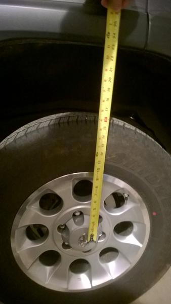 Rear wheel well spacing - post-lift