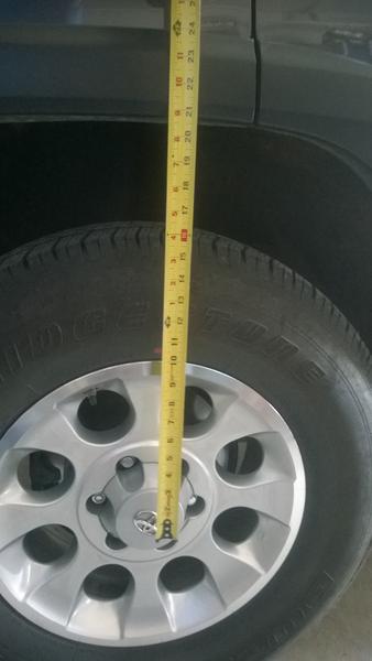 Rear wheel well spacing - pre-lift