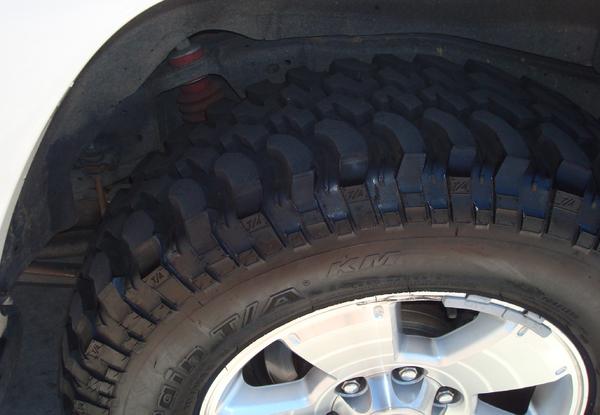 Rear with rancho shocks shown in back. Braking has decreased and loss about 1mpg. Road noise can be heard @ around 35mph.