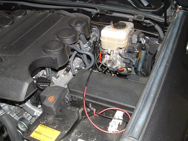 red/black taped cable inside engine compartment