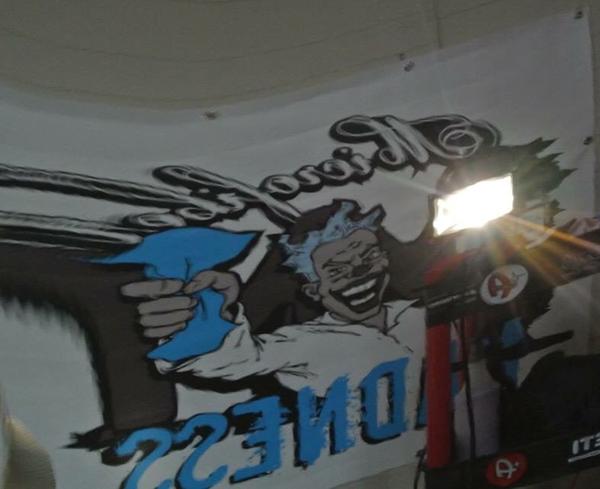 Reflection off of my T4R of a Banner on the wall