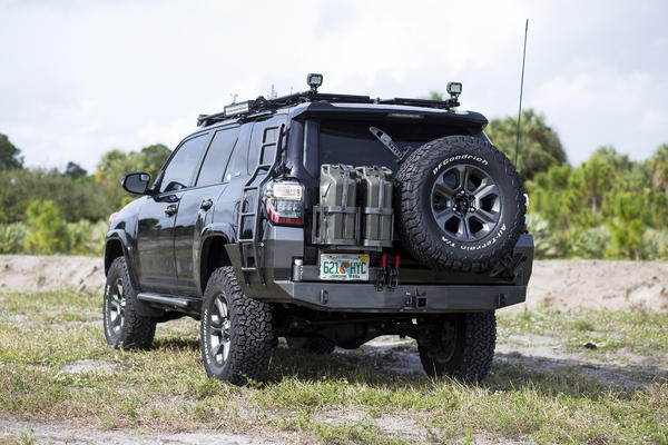relocated the license plate repainted the jerry cans a darker OD green