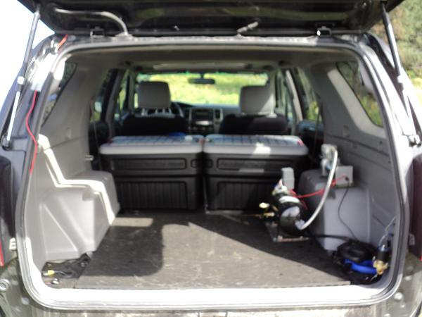 removed seats, rhino lined interior, train horn and air tool set. made a mat for the deck also