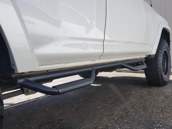 Removed side skirt and modified nfab steps to fit closer.
