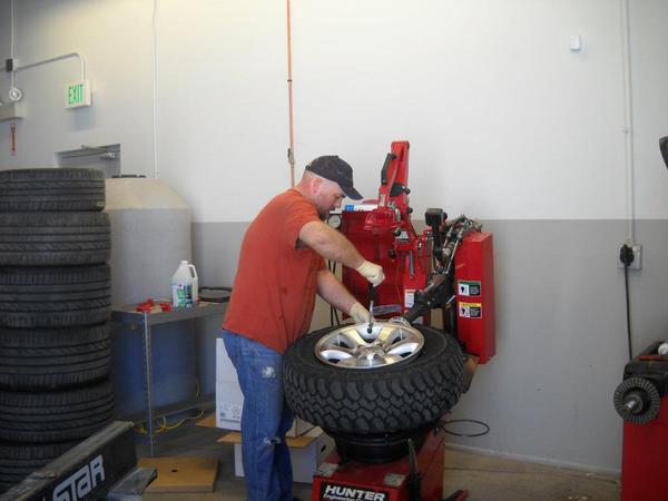 Removing the TPM sensors from the Sport wheels to install into the new Pro Comp wheels. Pain in the butt!!!