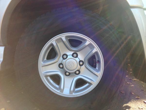 Repainted the plastic center caps. Can't believe the dealer wanted ~$60 each for these. 3 coats spray paint and good as new.