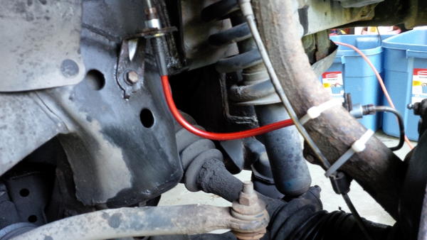 Replacement brake lines installed. I love tie wraps.