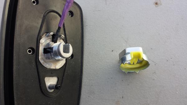 Retaining nut removed.