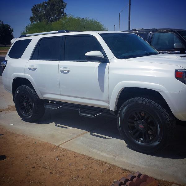 Revtek suspension lift kit, Cooper tires, and nerf bars. its coming along.