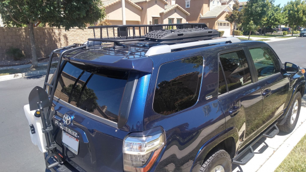 Roof Cargo basket, recovery boards, gobi ladder, rotopax, shovel, nerf bars.
