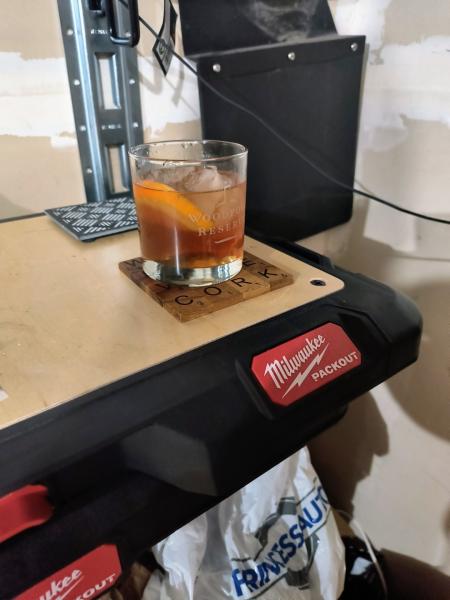 Runner Garage overpriced  Milwaukee shelf table. And Canadian Whiskey