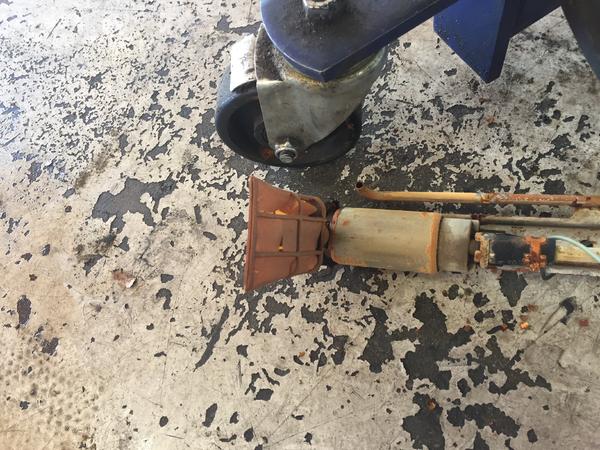 Rusty Fuel pump with torn sock..