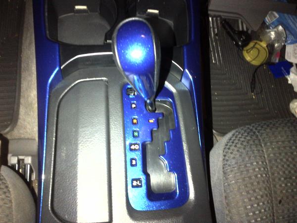 Shift knob trim installed back on knob and screwed back on