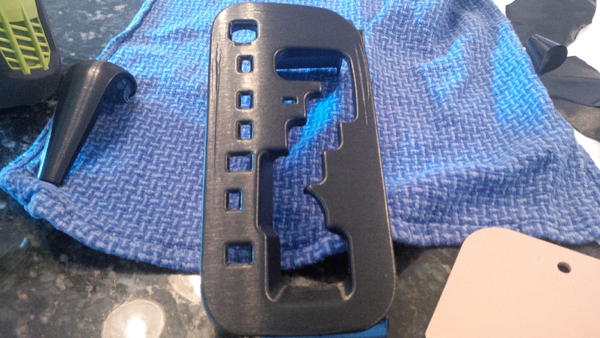 Shifter bezel and shift knob trim wrapped