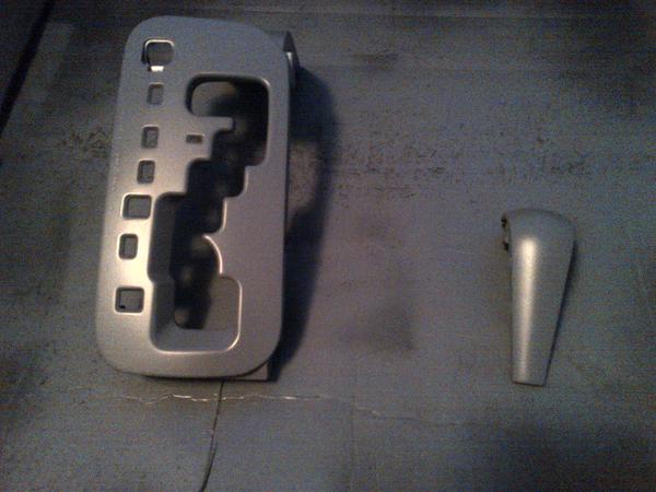 Shifter surround and shift knob trim primed