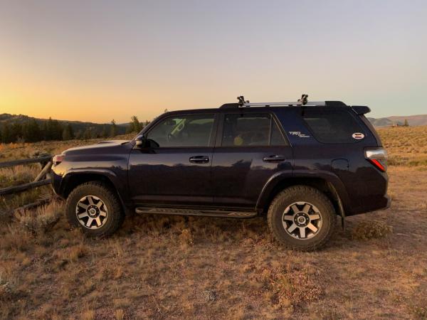 Side view with 2" lift and 255/80 Coopers