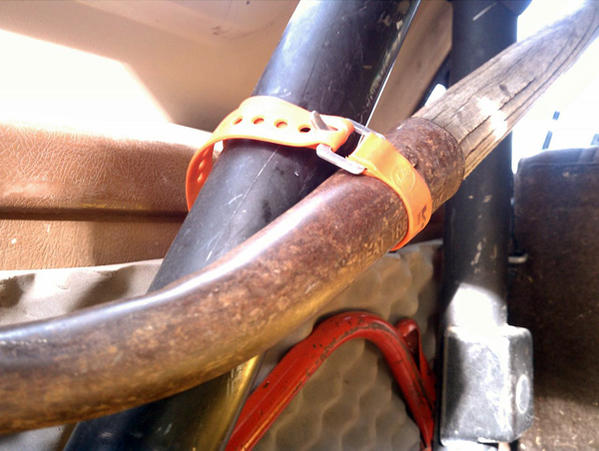 Ski straps used to secure tools to roll cage.