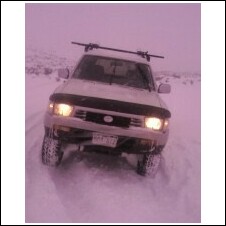 Snow wheeling up Signal Peak near Gunnison, CO