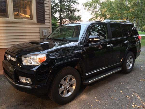 so far on the upgrades are trail hood and TRD stickers on the back fender. step boards too.. I'm thinking they have to go though.