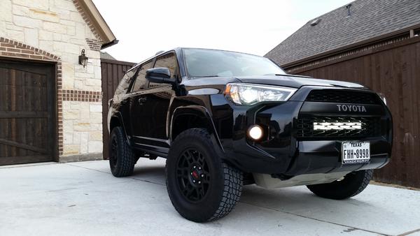 Spidertrax spacers are a must! They do rub a little though.