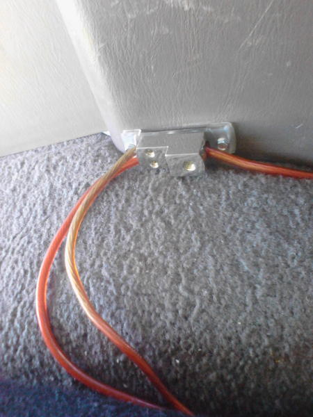 Splitter.....main power (fused of course) coming from battery, split here for constant 12v outlet and power for my Rockford sub and amp combo.